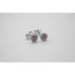 Fine 9ct White Gold Ruby and Diamond Earrings They're 9ct White Gold set with Rubies and Diamonds.
