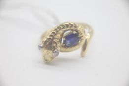 Heavy high carat gold diamond and sapphire snake ring. Measures M 1/2 . Weighs 9.2 grams