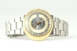 AUTOMATIC OMEGA DYNAMIC, Champagne and grey dial with date function. 42mm oval gold plated case.