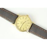 LADIE MANUAL WIND OMEGA DE VILLE, Champagne dial. In a 24mm Oval gold plated case. On a leather