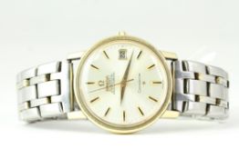 AUTOMATIC OMEGA CONSTELLATION, Silver sunburst dial with date function. 35mm gold plated case. On
