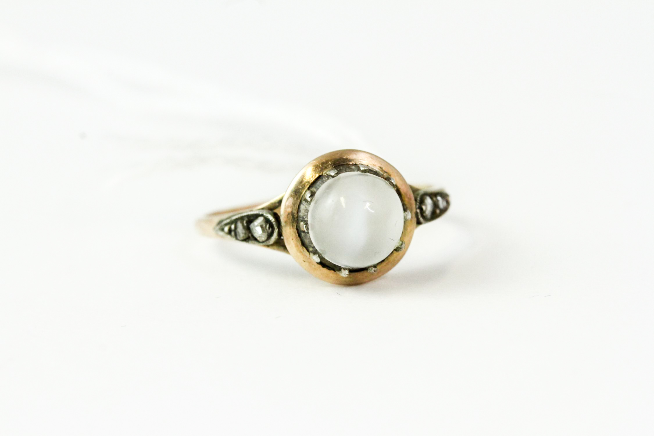 Antique gold and rose diamond moonstone ring. Measures uk size p 1/2 , set with rose diamonds and