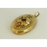 Antique Victorian high carat gold and rose diamond locket. Set with a rose cut diamond in the