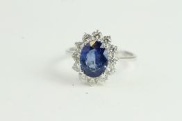 18WG Oval Sapphire and Diamond Cluster Ring. S2.54ct & D0.99ct