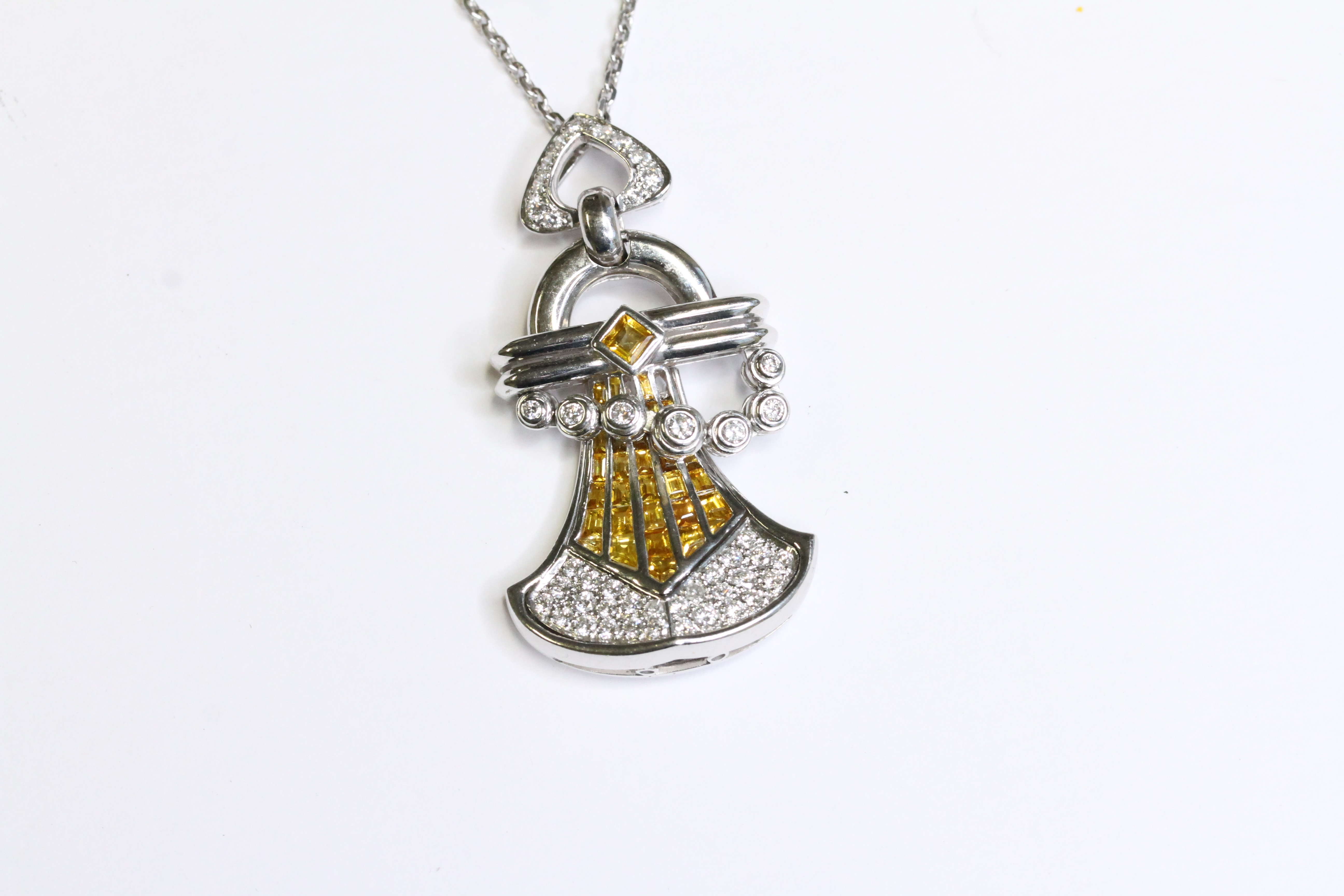 Fine 18ct gold and diamond yellow sapphire necklace . Set in white gold in 18ct , marked.