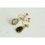 Fine 14ct gold and opal turn screw drop earrings. Marked 14k . Measures 2.5cm x 1.2cm wide. Weighs