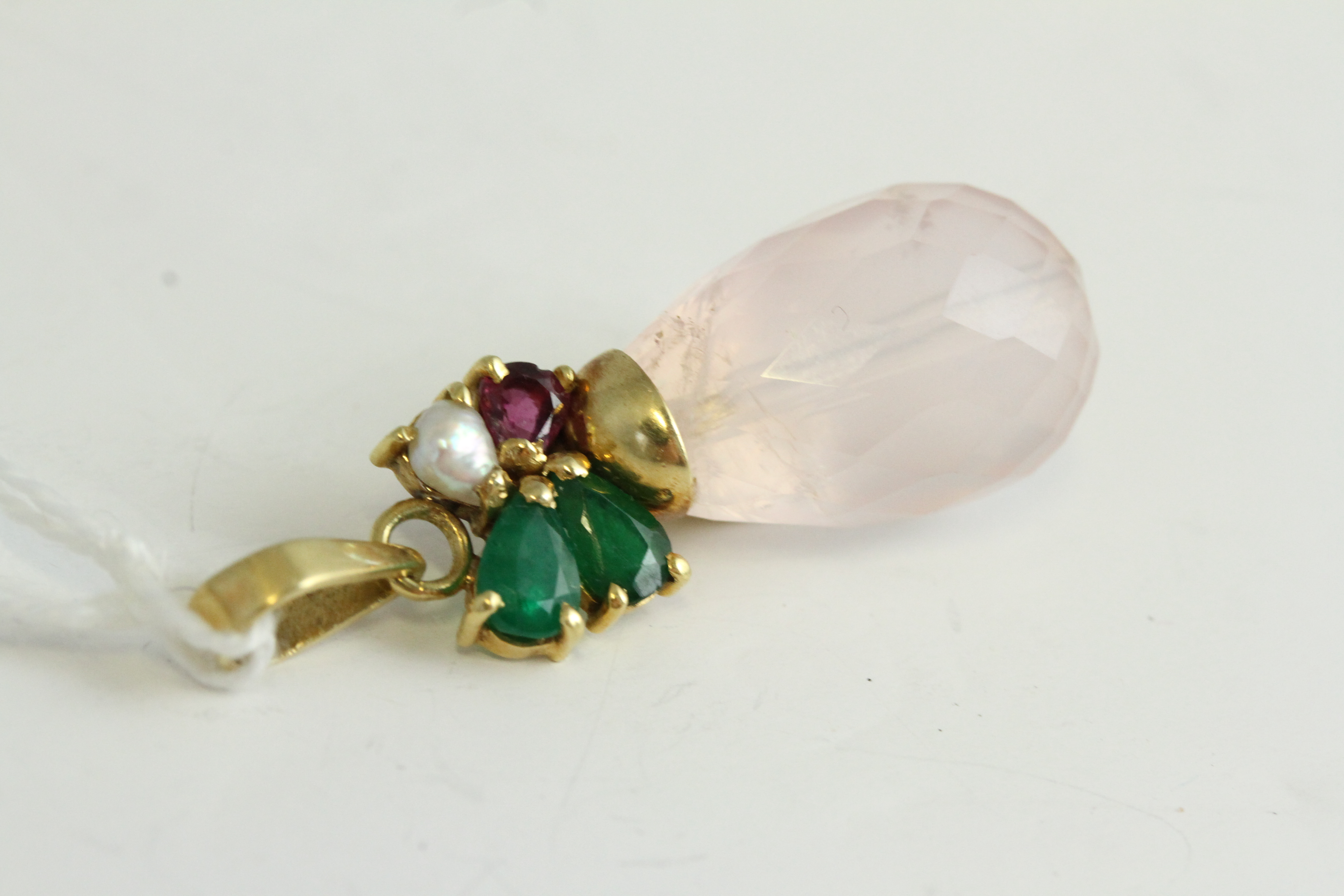 Fine 18ct gold emerald and rose quartz drop pendant. Set with emeralds, ruby and a pearl and a large