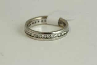 Fine 18ct white gold and diamond Channel set full eternity ring. Uk size K . Fully hallmarked for