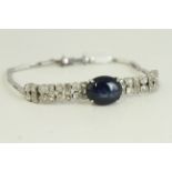 Antique Art Deco 18ct white gold sapphire and diamond bracelet. Set with a large 10.3 carat cabochon