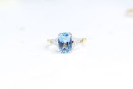 Fine 18ct gold aquamarine and diamond ring. Set in 18ct gold hallmarked. The aquamarine measures