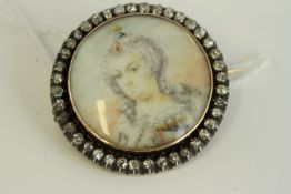 Antique rose gold and silver diamond hand painted miniature portrait locket brooch . Set in rose
