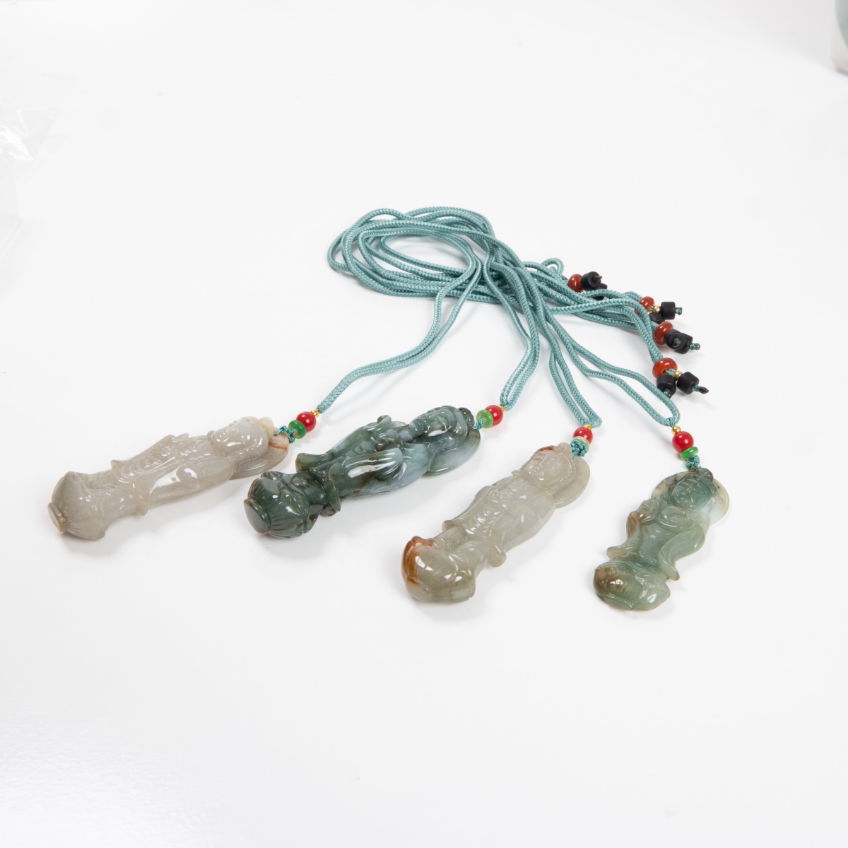 Group Of 4 Jade / Varied Stone Guan Yin Pendants - Image 2 of 6