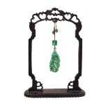 Jade Pendant On Wood Hanging Frame