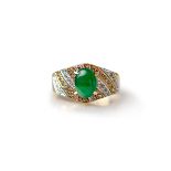 A FINE EMERALD AND DIAMOND RING