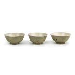 GROUP OF THREE CREAM GLAZE BOWLS