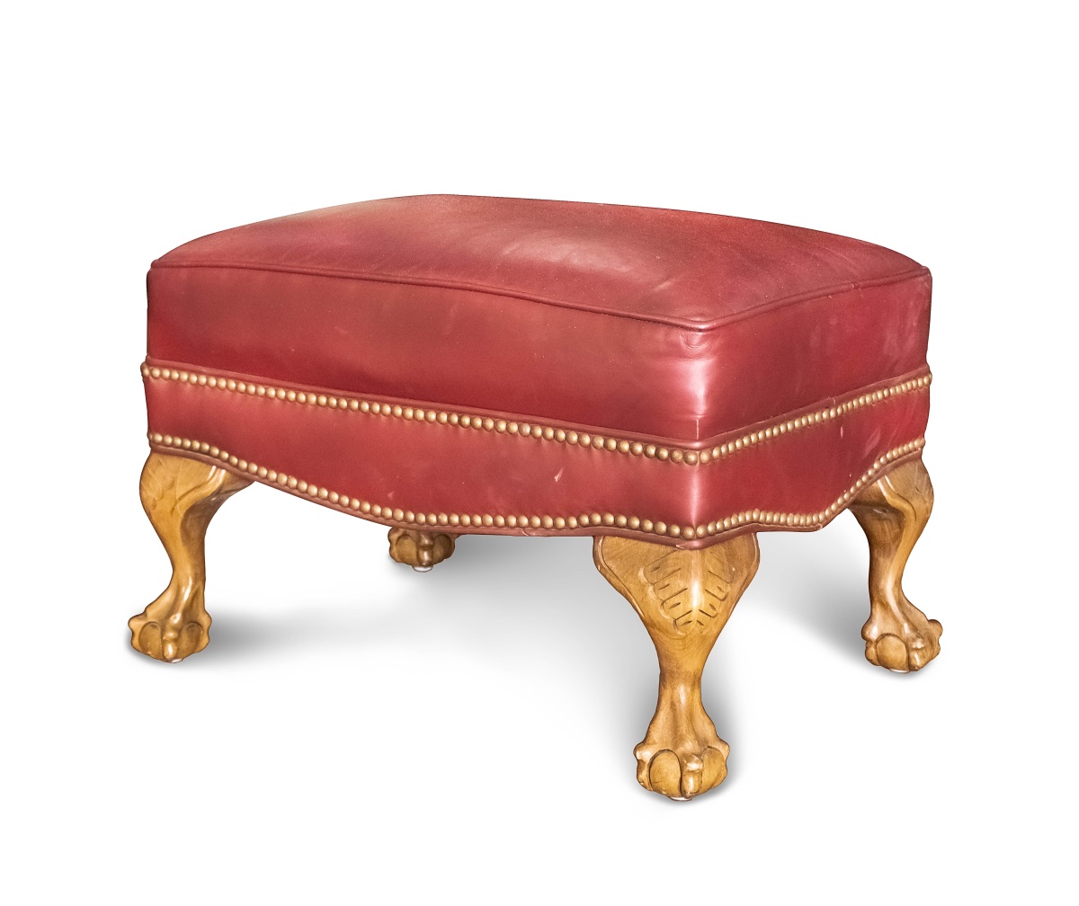 LEATHER OTTOMAN WITH CLAWED FEET