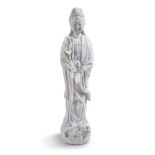 PORCELAIN GUANYIN STANDING ON DRAGON