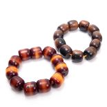 TWO AMBER BEADED BRACELETS