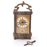 GILT BRONZE CARRIAGE CLOCK WITH ALARM AND KEY