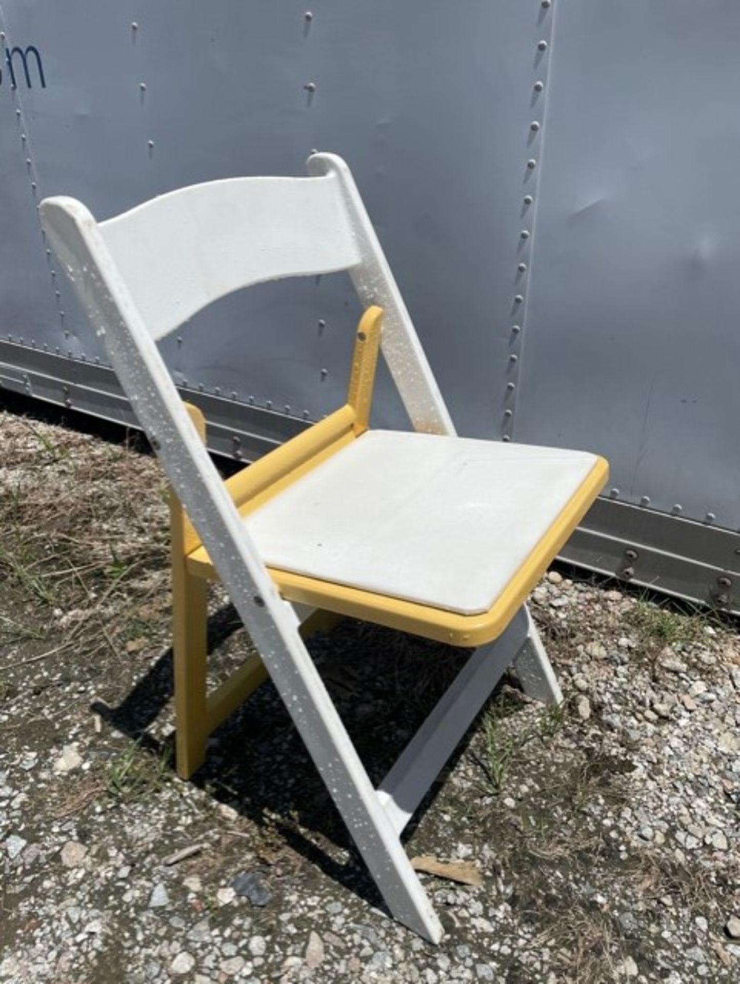 White & Yellow Resin Chairs