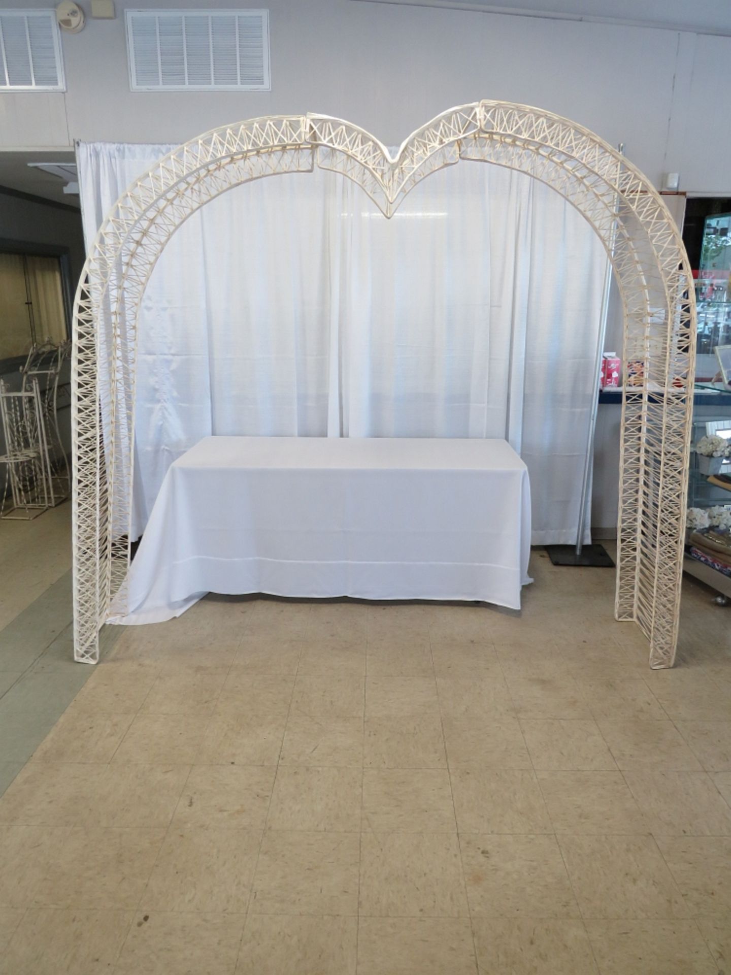 White Wicker Heart Arch