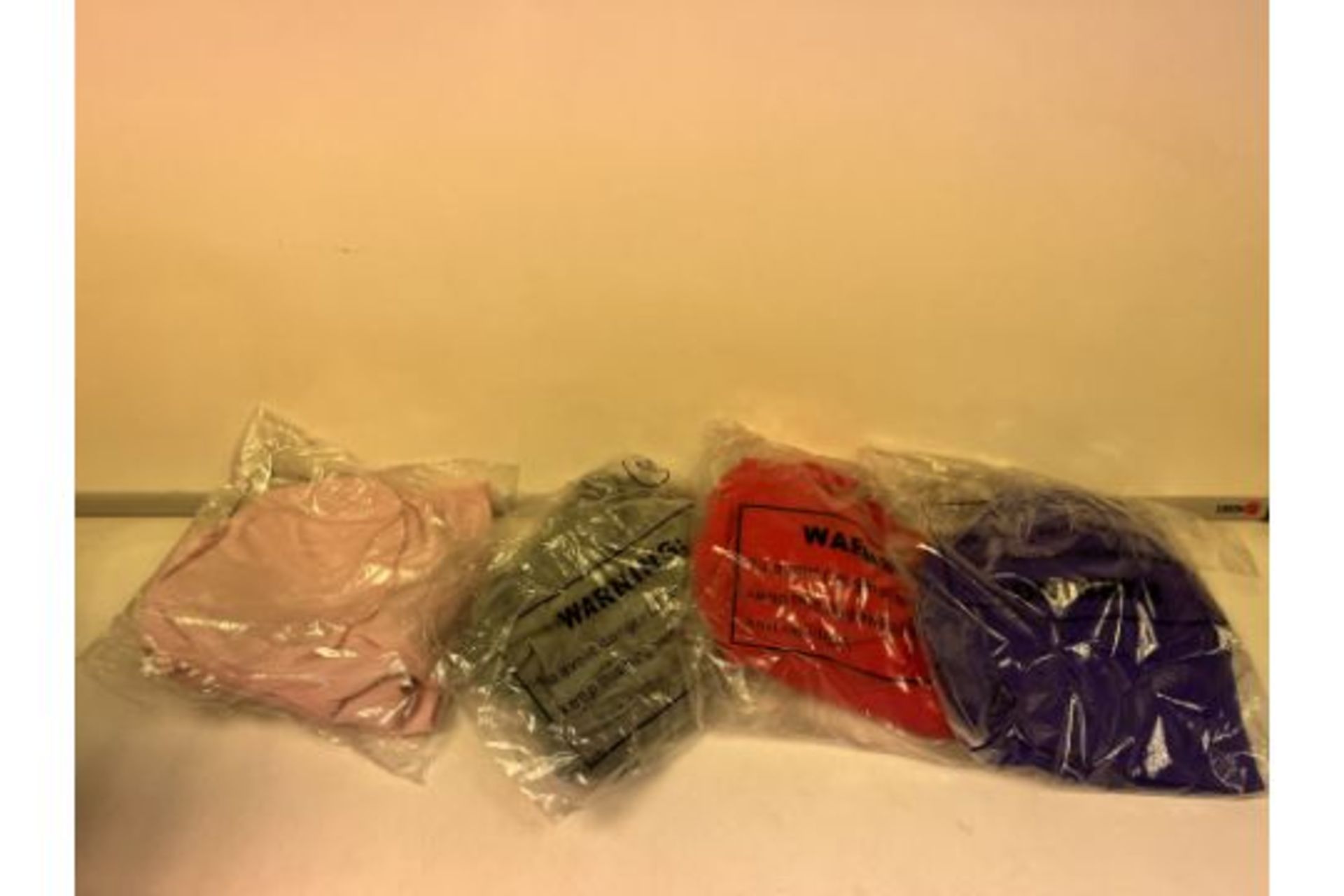 50 X BRAND NEW SPORTS BRAS IN VARIOUS SIZES AND COLOURS R19