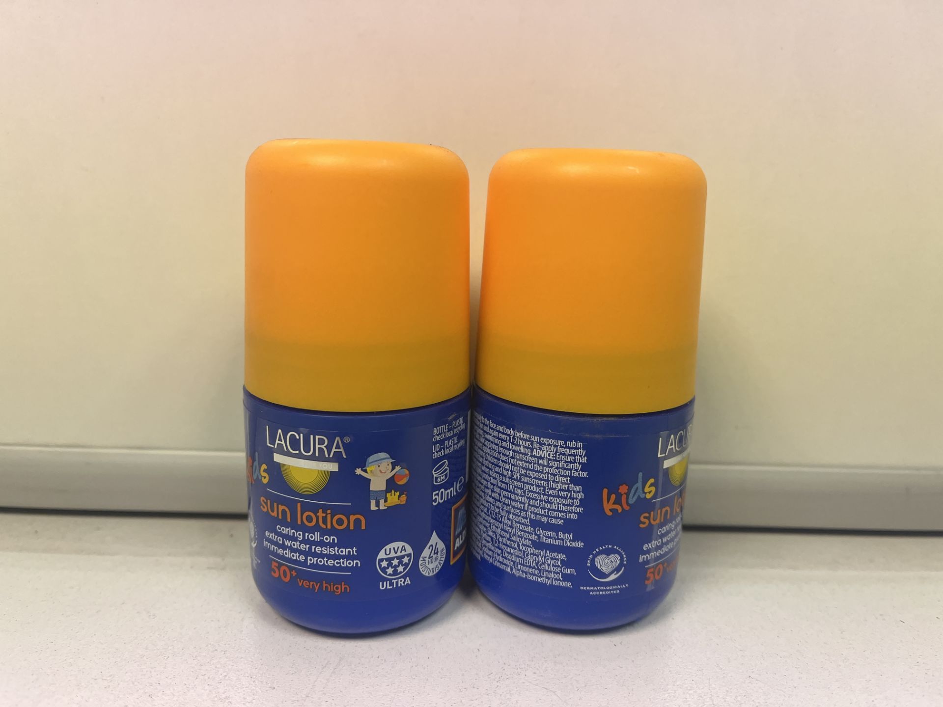 48 X LACURA KIDS SUN LOTION. CARING ROLL ON. EXTRA WATER RESISTANT. IMMEDIATE PROTECTION. 50+ VERY
