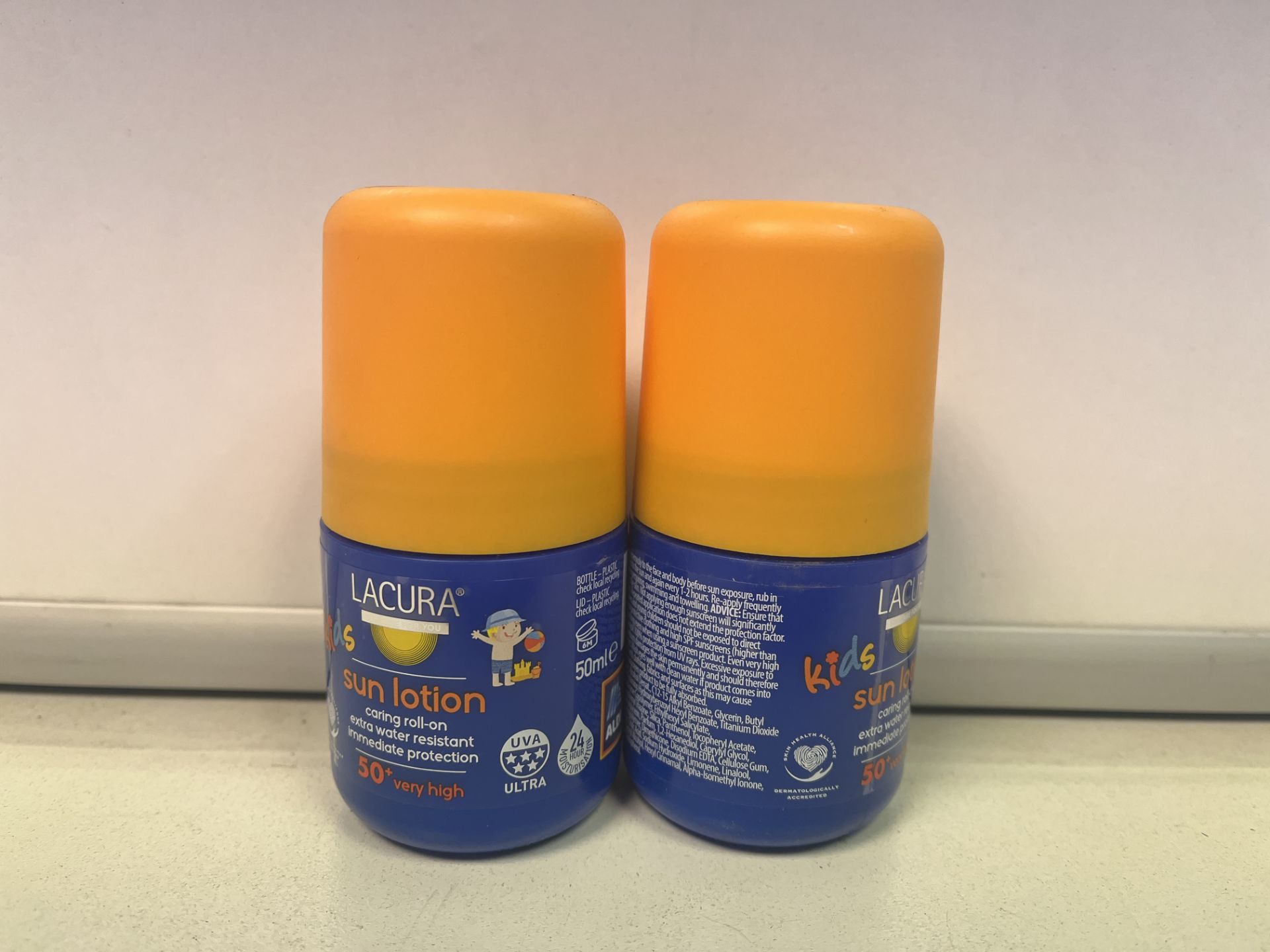 48 X LACURA KIDS SUN LOTION. CARING ROLL ON. EXTRA WATER RESISTANT. IMMEDIATE PROTECTION. 50+ VERY