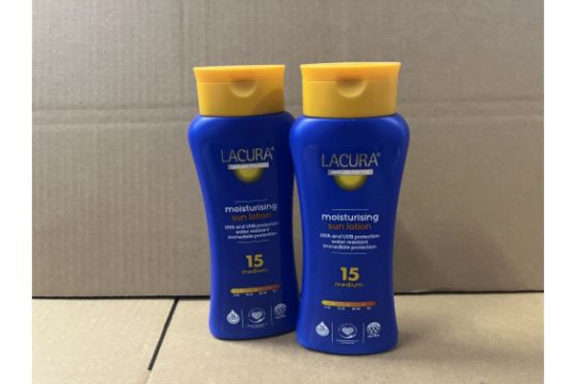 48 X LACURA MOISTURISING SUN LOTION. UVA & UVB PROTECTION. WATER RESISTANT. IMMEDIATE PROTECTION. 15