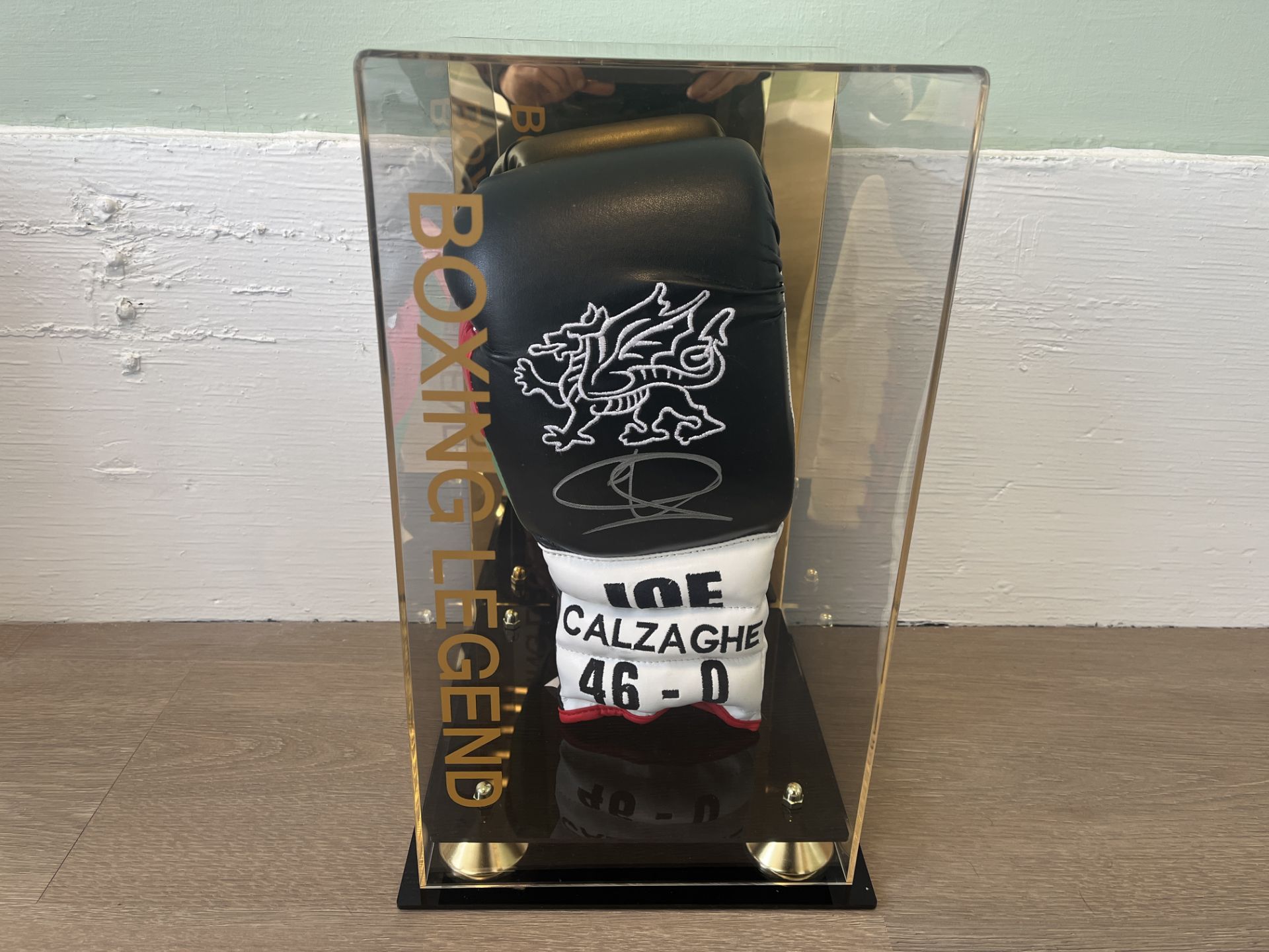 FRAMED & PERSONALLY SIGNED WELSH BOXING GLOVE BY BOXING LEGEND JOE CALZAGHE WITH EMBROIDED