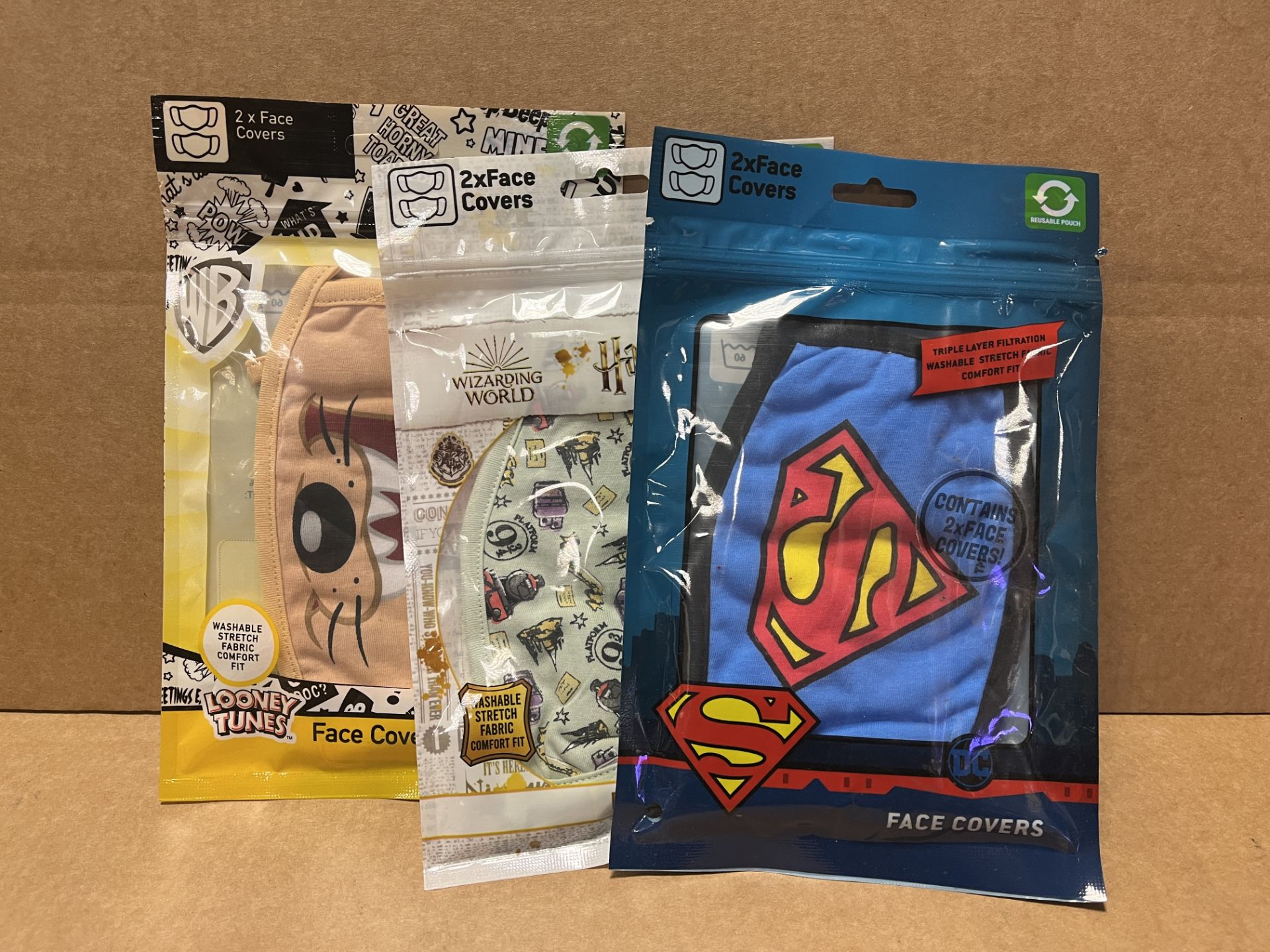 34 X BRAND NEW PACKS OF 2 COLLECTABLE FACE MASKS INCLUDING HARRY POTTER, SUPERMAN ETC EBR