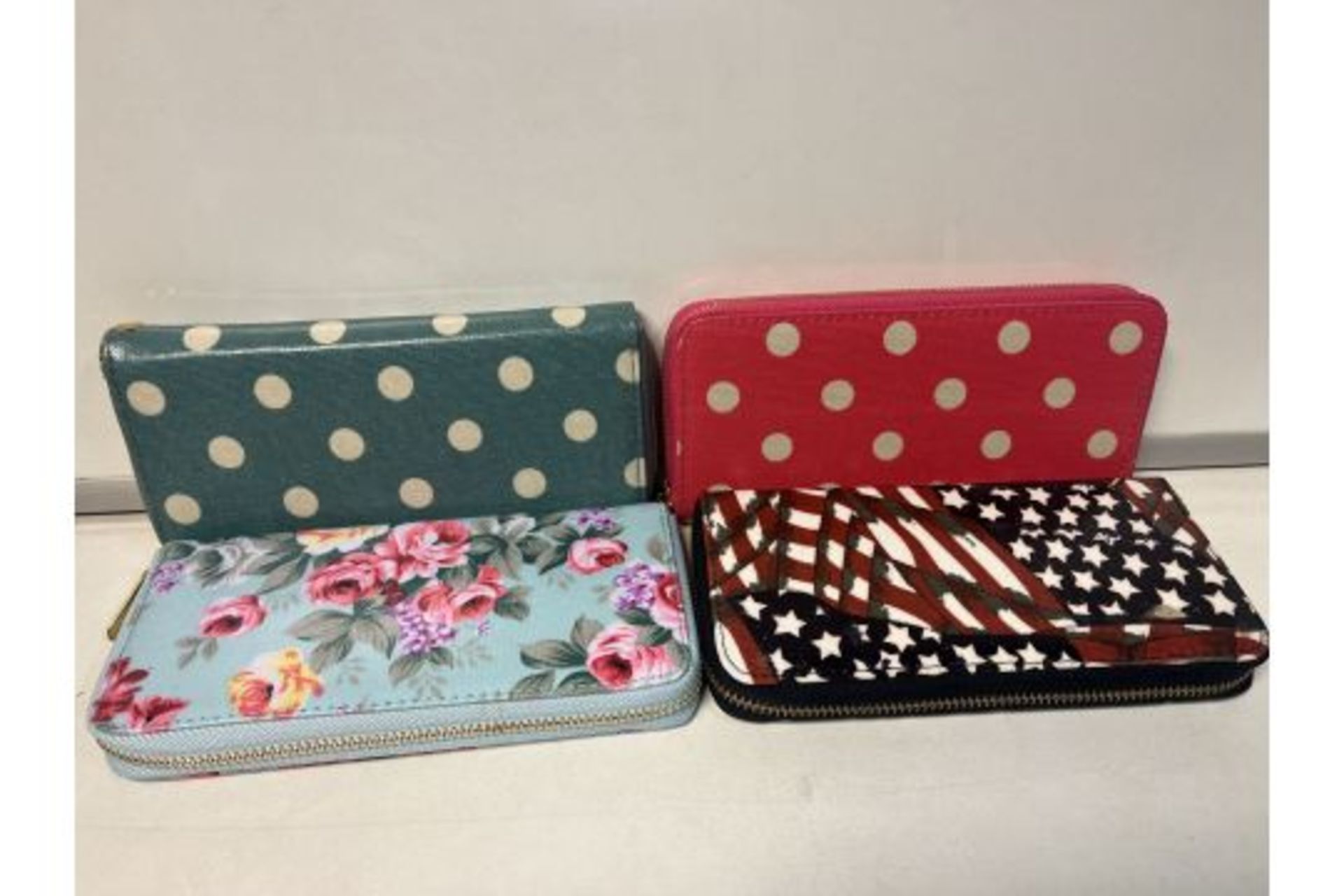 30 x NEW PACKAGED LARGE LADIES PURSES. IN ASSORTED DESIGNS (ROW1)