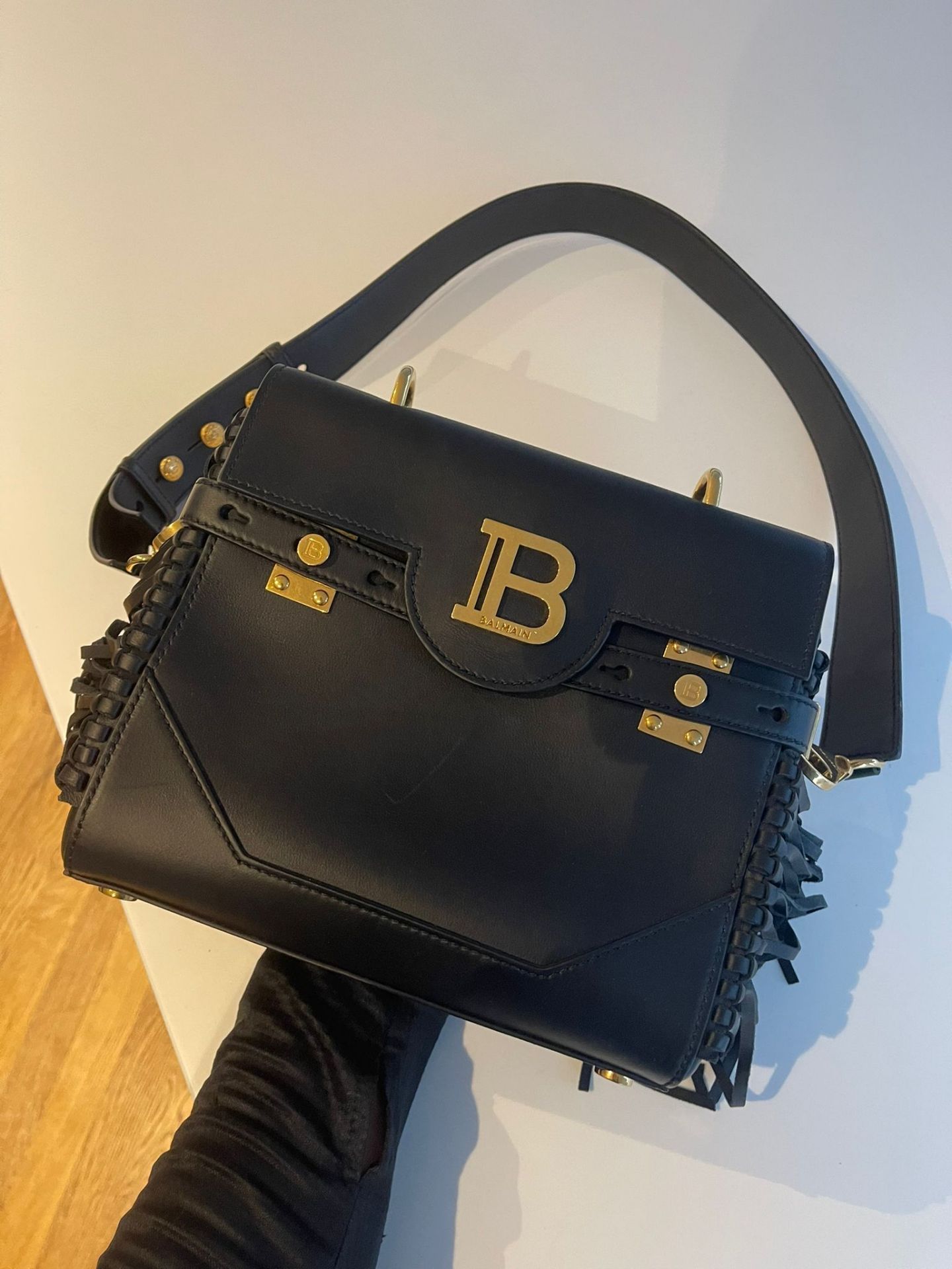 Balmain Smooth black leather B-Buzz 23 bag. RRP £1850.00. Black calfskin B-Buzz 23 bag Fringe panel,