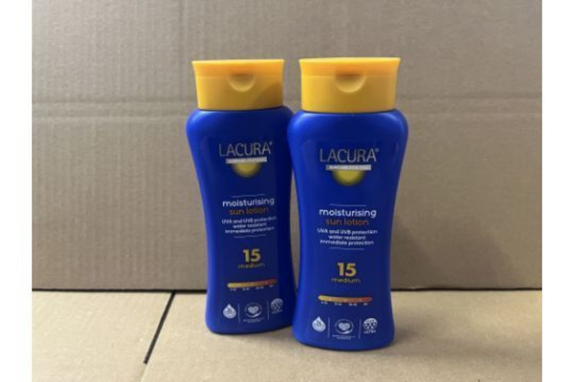 PALLET TO CONTAIN 360 X LACURA MOISTURISING SUN LOTION. UVA & UVB PROTECTION. WATER RESISTANT.