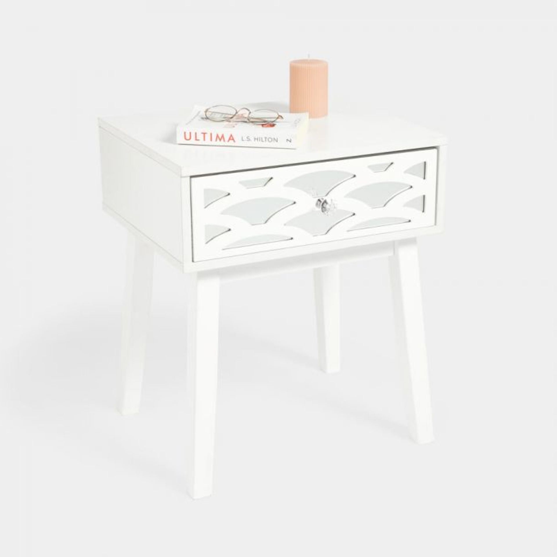 Harley Mirrored 1 Drawer Bedside Table. Featuring clean lines & edges, the mirrored glass design