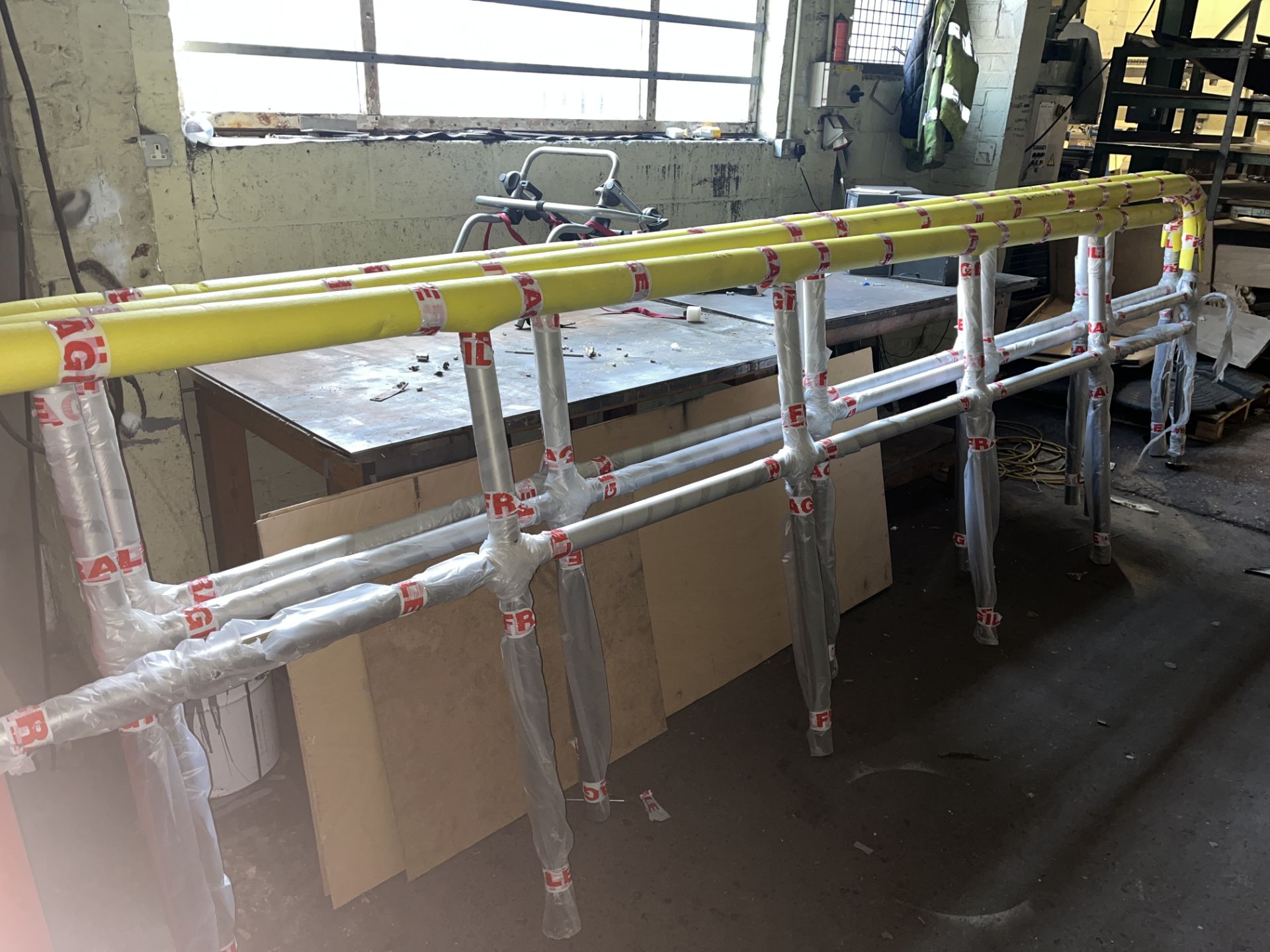 BRAND NEW STAINLESS STEEL RAILINGS IN 3 PIECES. SIZE APPROX: 3 SECTIONS ADDING UP TO 12.2M LONG (