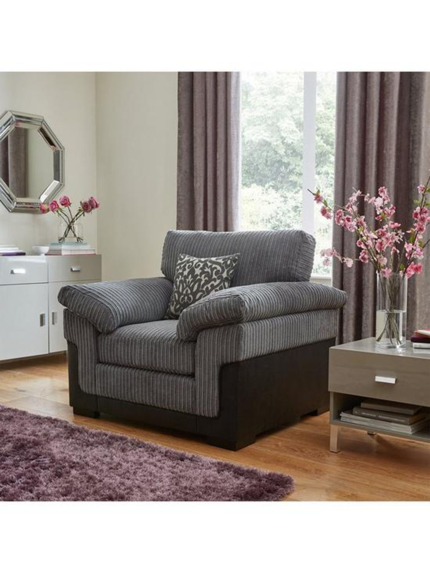 Phoenix Chair. RPP £509.00. Fabric fusion Chunky lines of soft jumbo cord give the inner a
