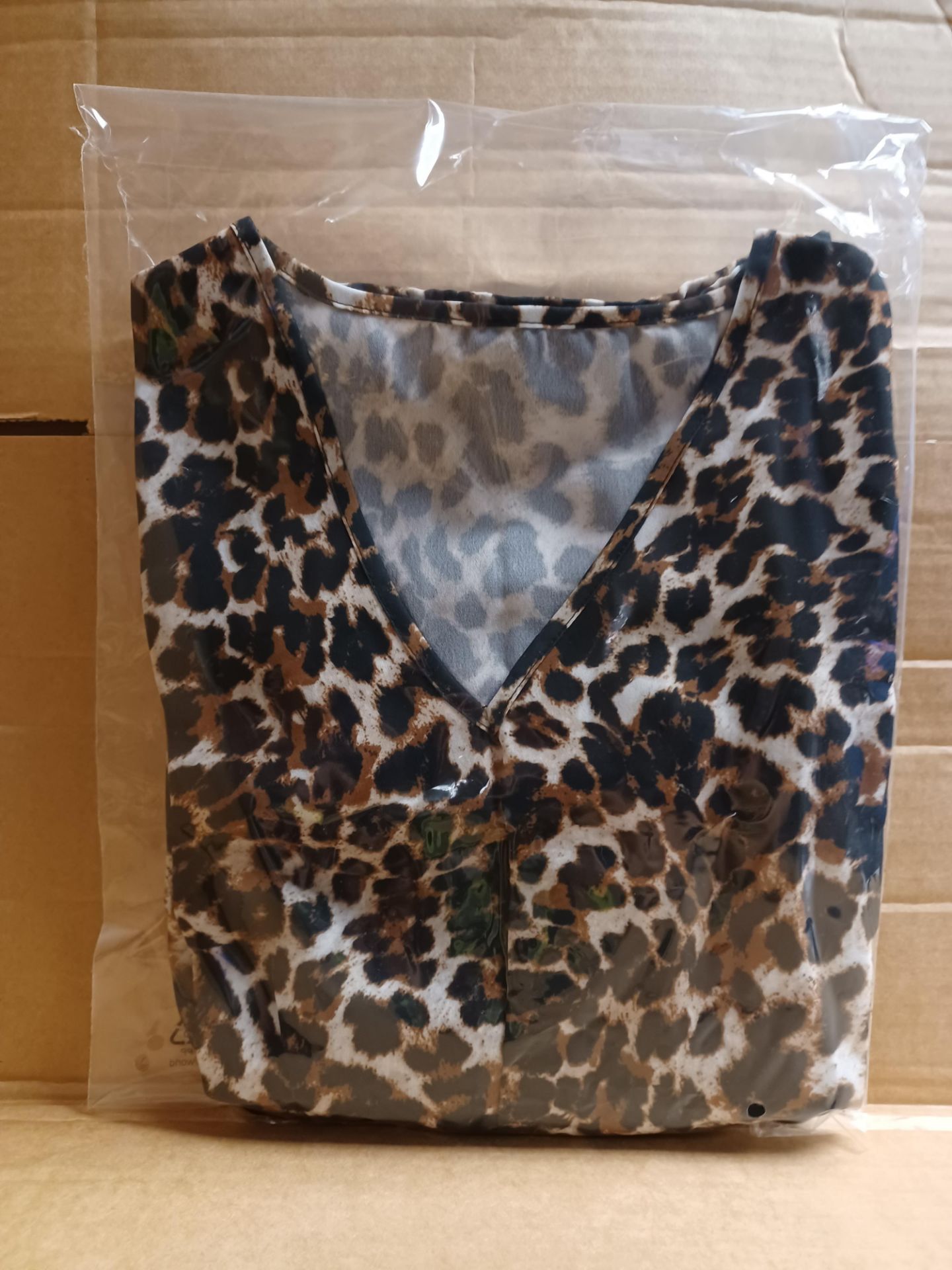 APPROX. 50 X NEW PACKAGED AVON LEOPARD BLOUSES. EBR
