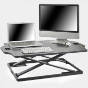 Adjustable Standing Desk. Made to offer optimal comfort, this sit to stand workstation allows you to