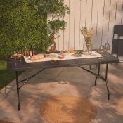Faux Black Rattan Foldable Garden Table. Ideal for dining al fresco or making sure there’s room
