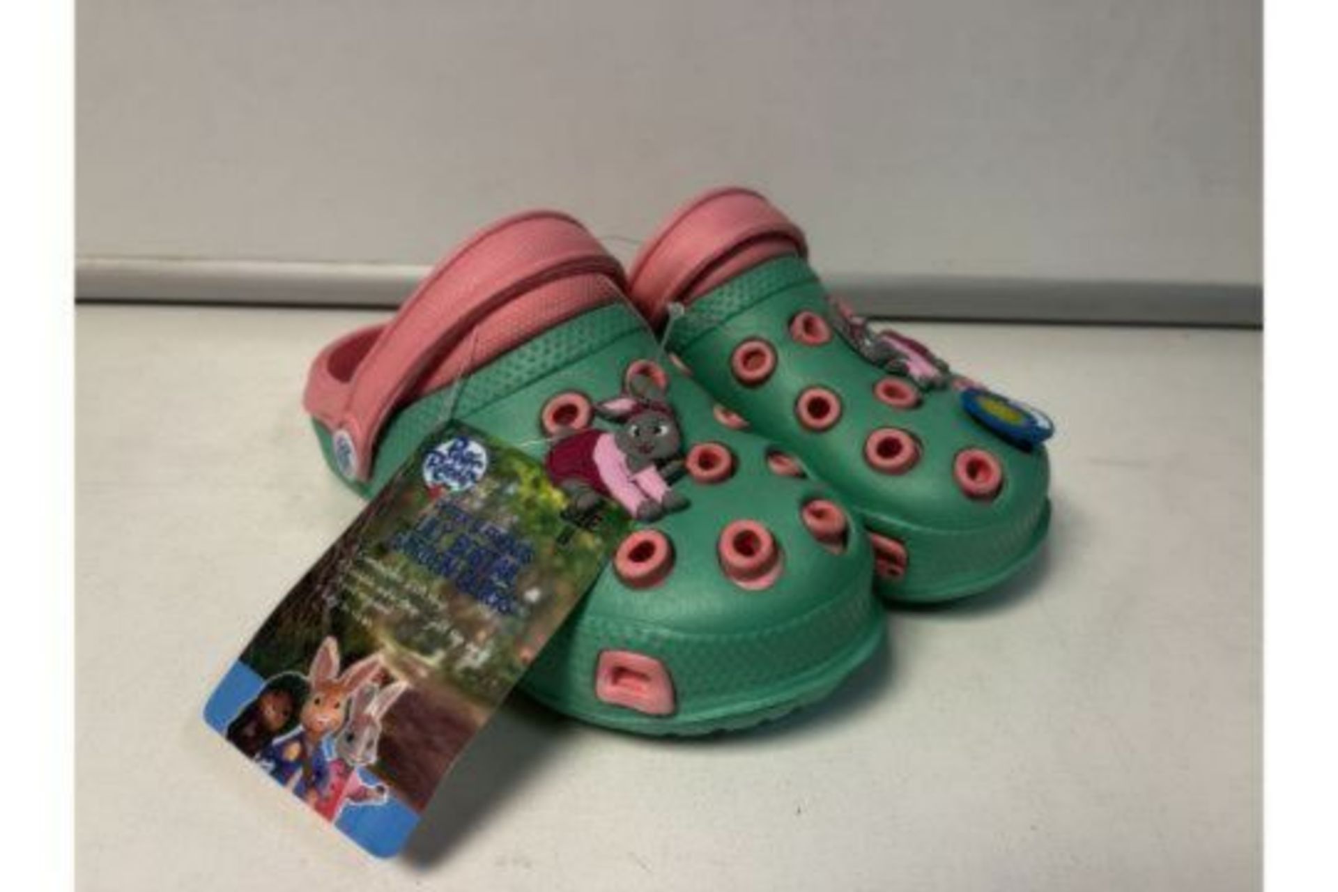 18 X NEW PAIRS OF PETER RABBIT & FRIENDS LILY BOBTAIL GARDEN CLOG CHILDRENS SHOES. SIZES MAY