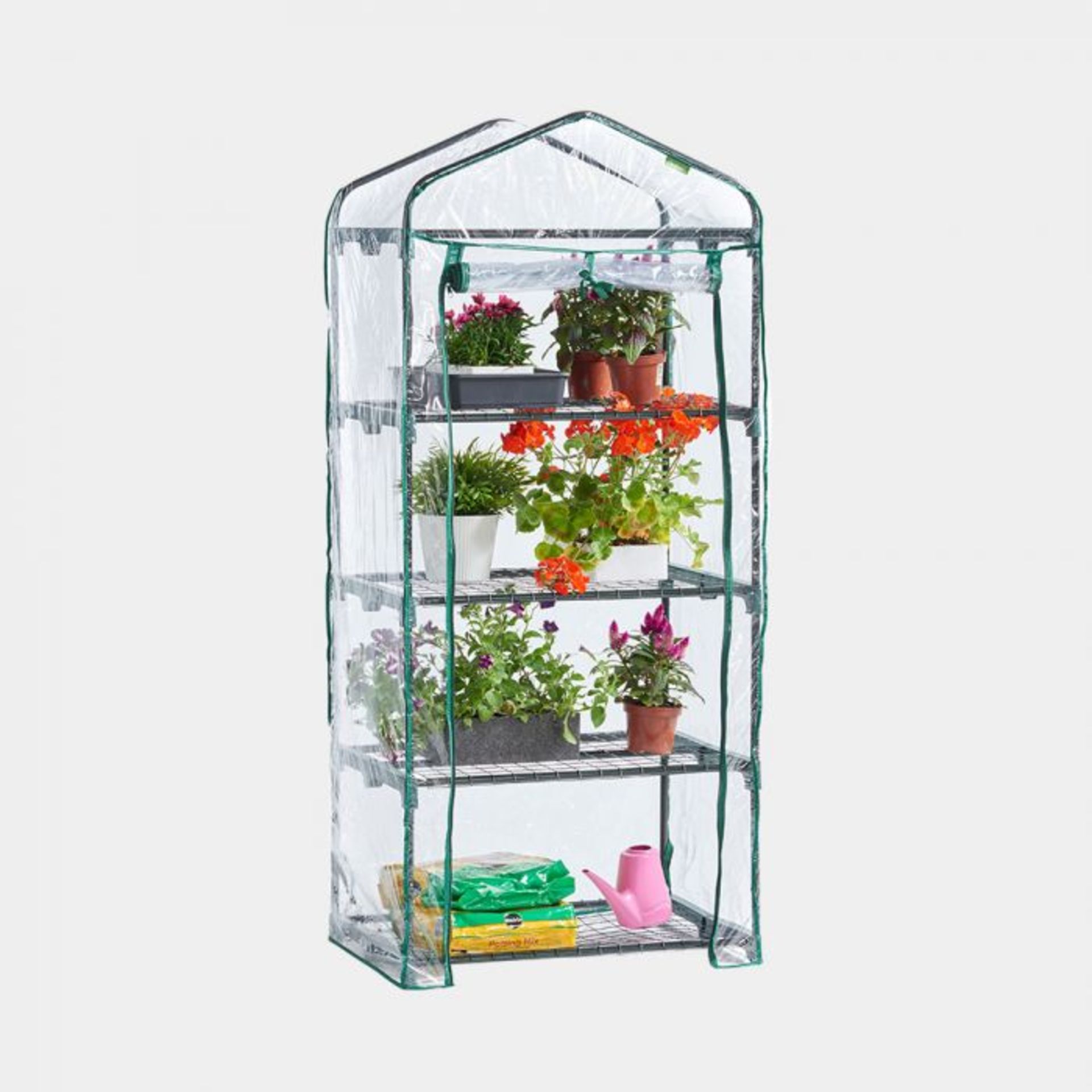 4 Tier Mini Greenhouse. Small but effective, this system acts as a barrier against adverse weather –