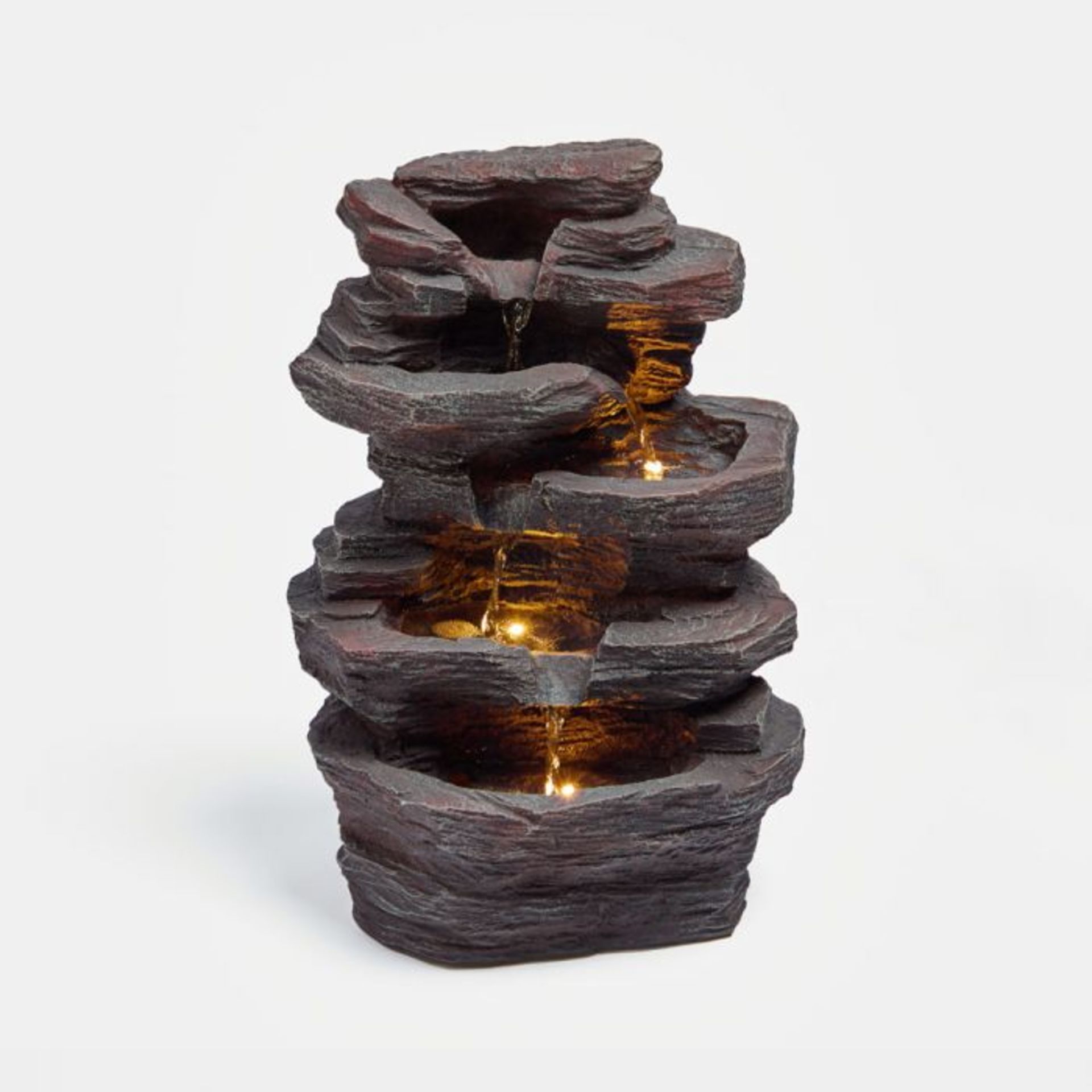 4 Tier Natural Rock Water Feature. The perfect meditative accessory to add a feeling of calm to your