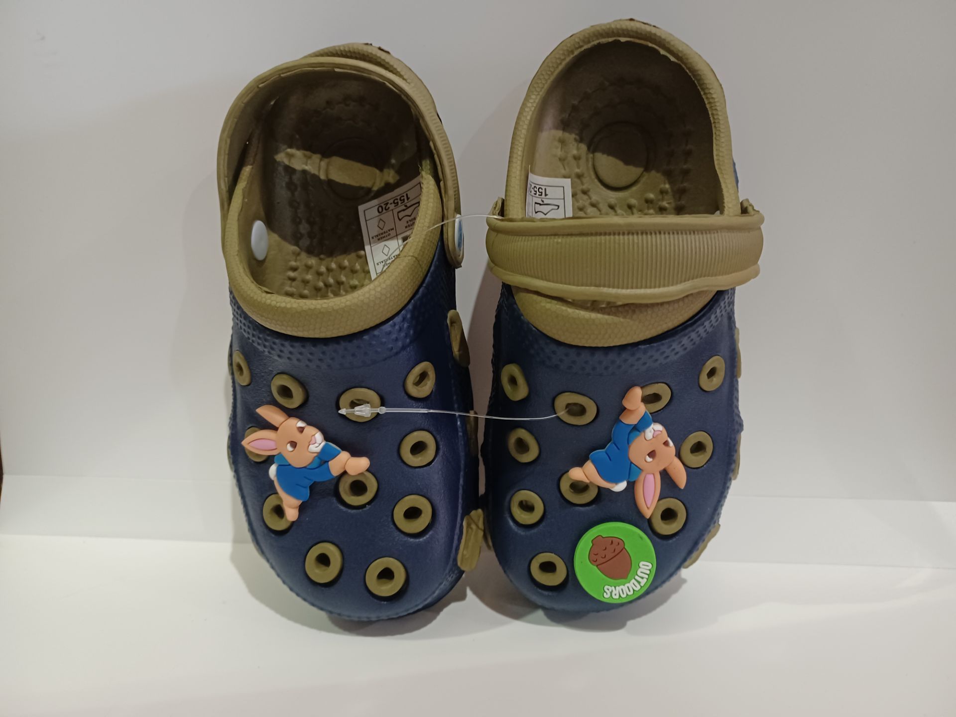 18 X NEW PACKAGED PAIRS OF PETER THE RABIT CLOGS STYLE CHILDRENS SHOES. ROW 3RACK