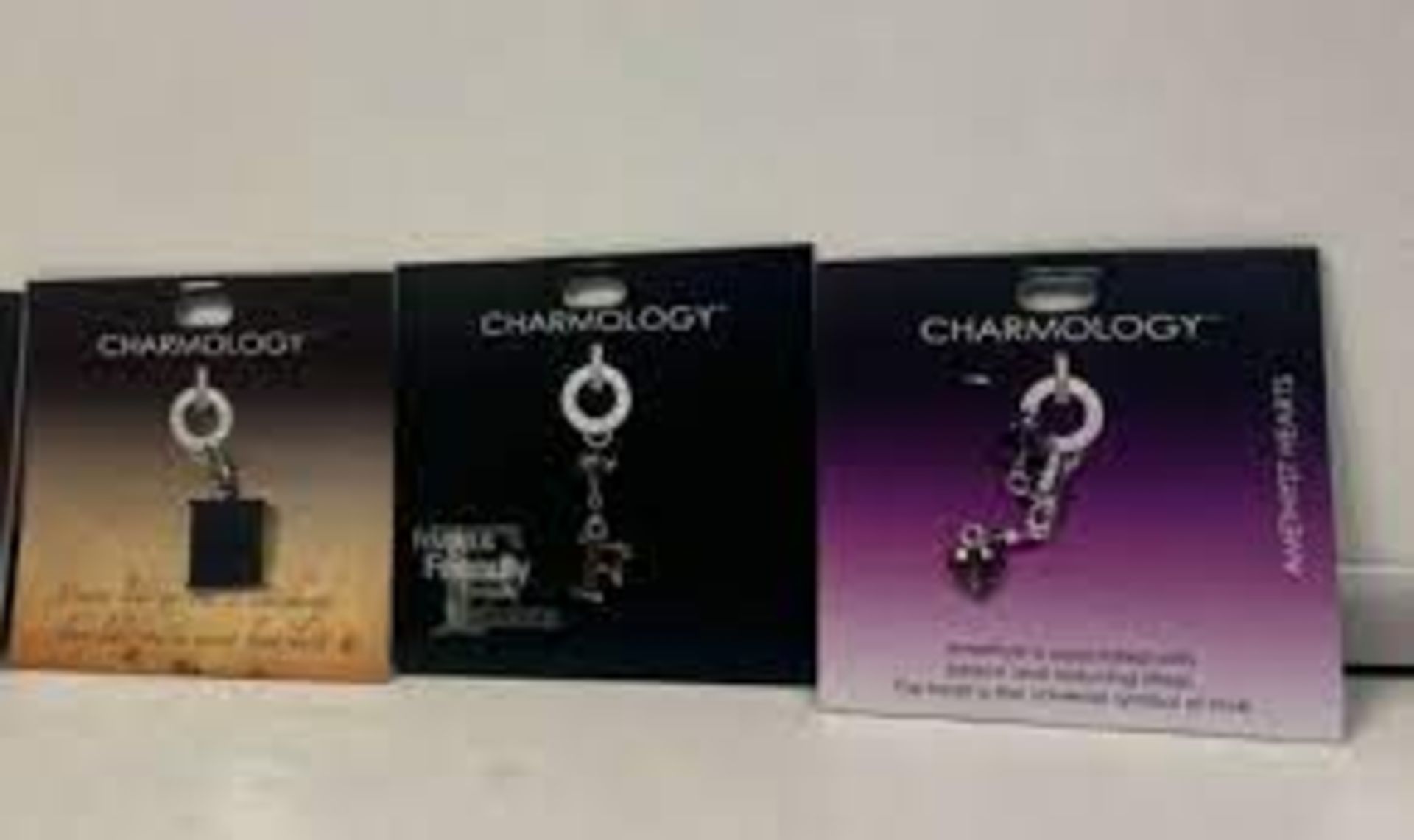 400 X BRAND NEW ASSORTED CHARMOLOGY CHARMS R3