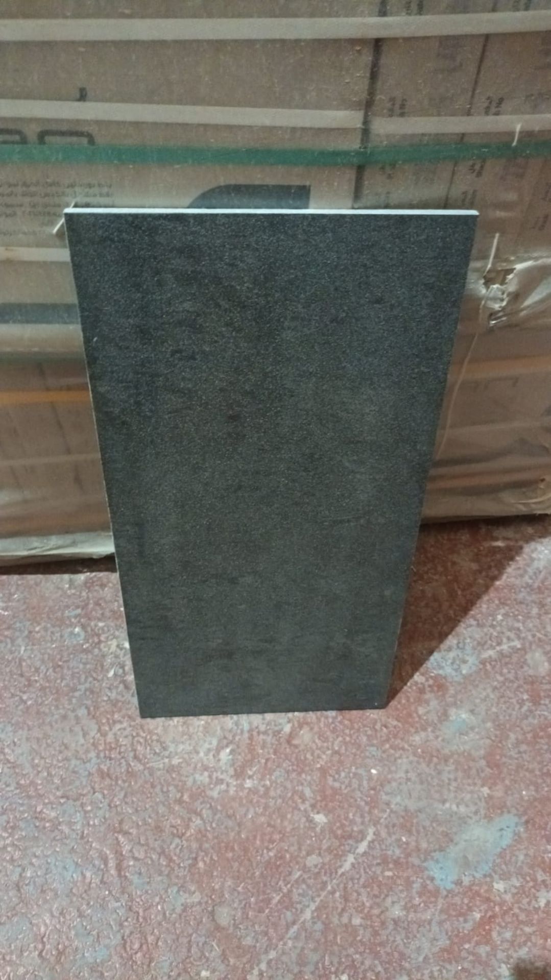 PALLET TO CONTAIN 24 X PACKS OF PORCELLAN POLISHED ANTHRACITE GREY POLISHED FLOOR & WALL TILES.