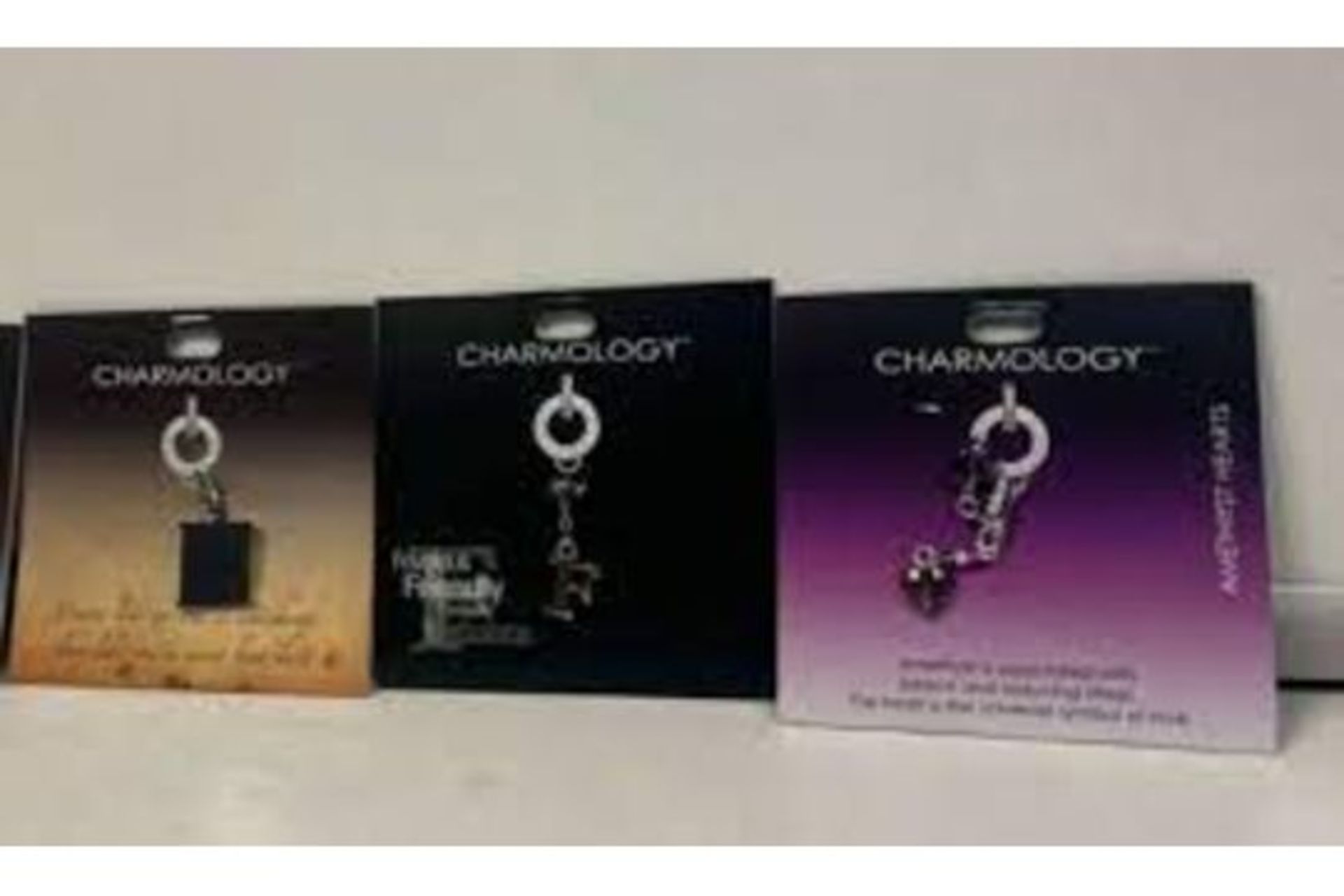 200 X BRAND NEW ASSORTED CHARMOLOGY CHARMS R3