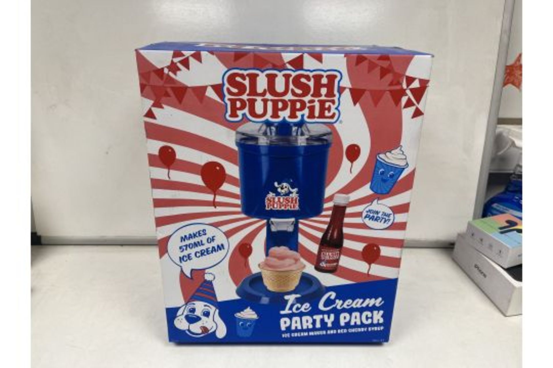 PALLET TO CONTAIN 24 X NEW BOXED SLUSH PUPPIE ICE CREAM PARTY PACK. ICE CREAM MAKER AND RED