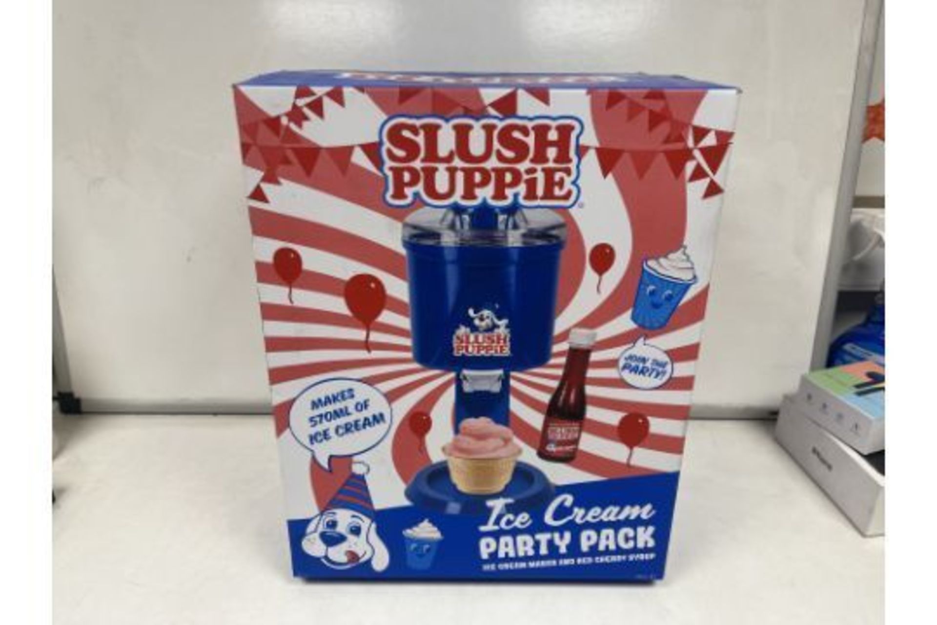 PALLET TO CONTAIN 24 X NEW BOXED SLUSH PUPPIE ICE CREAM PARTY PACK. ICE CREAM MAKER AND RED