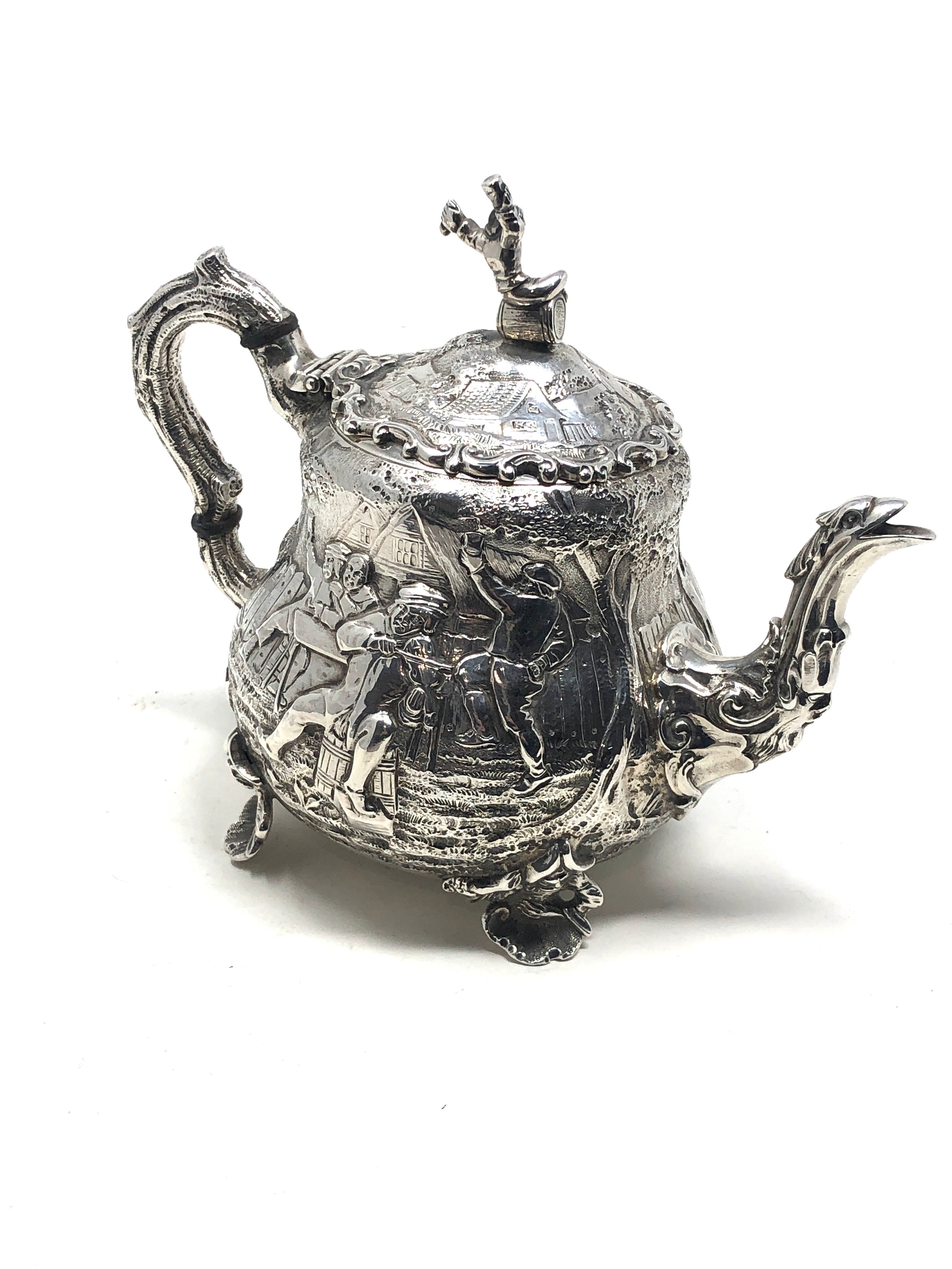 Fine Antique Victorian silver bachelor teapot either side with scenes after "Tennier" London